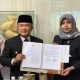 Caption gambar: Penandatanganan MoU sidang keliling antara PN Kuningan dan Pemkab Kuningan sebagai upaya mendekatkan layanan hukum kepada masyarakat. (Foto: dok. dandapala)