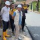 Bupati Kuningan, Dr. Dian Rachmat Yanuar bersama sejumlah pihak saat meninjau perbaikan jalan Japara-Cikeleng-Koreak. (Foto: dok. ist)